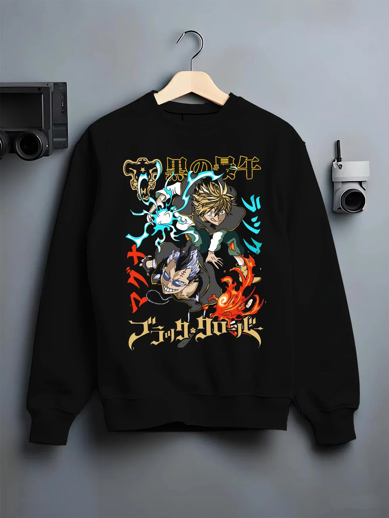 Black crewneck sweatshirt on hanger with Asta Nacht Hoodie Black Clover Devil Contract Flames graphic streetwear graphic.