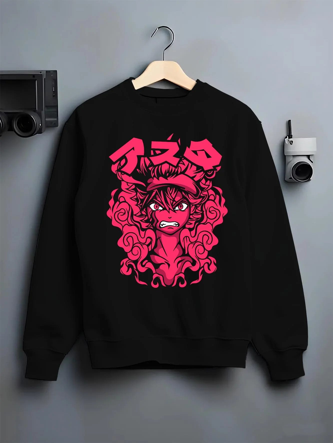 Black crewneck sweatshirt on hanger with Asta Demon Rage Hoodie Black Clover Red Eyes Power graphic premium wear.