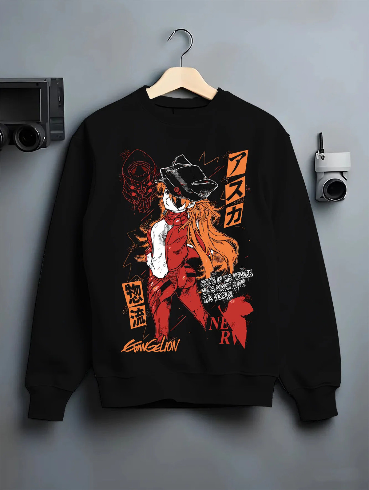 Black crewneck sweatshirt on hanger showing Evangelion: orange-haired pilot and mecha illustration
