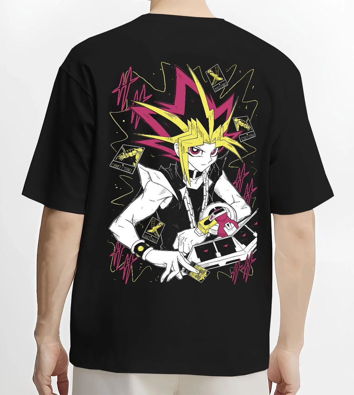 Black T-shirt worn by male model from the back featuring Atem and Dark Magician Yu-Gi-Oh duel spirit artwork.