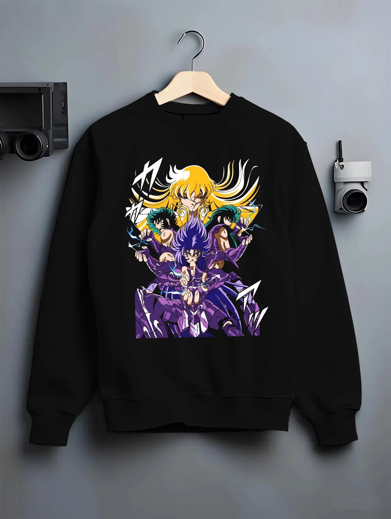 Black crewneck sweatshirt on hanger with Athena Hoodie Saint Seiya Zodiac Warriors Mythic Print graphic bold anime graphic.