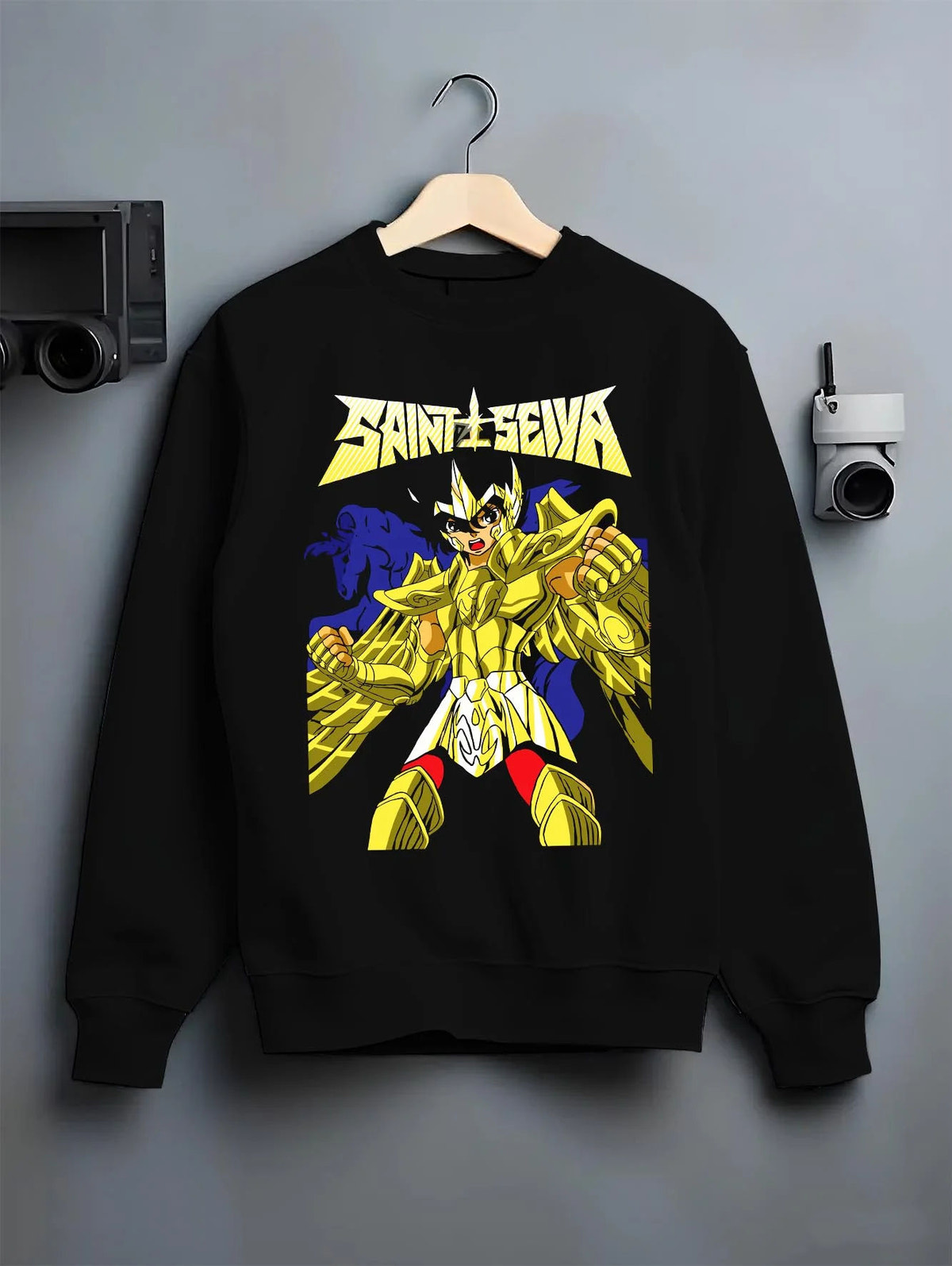 Black crewneck sweatshirt on hanger featuring Athena Saint Seiya Gold Armour artwork.