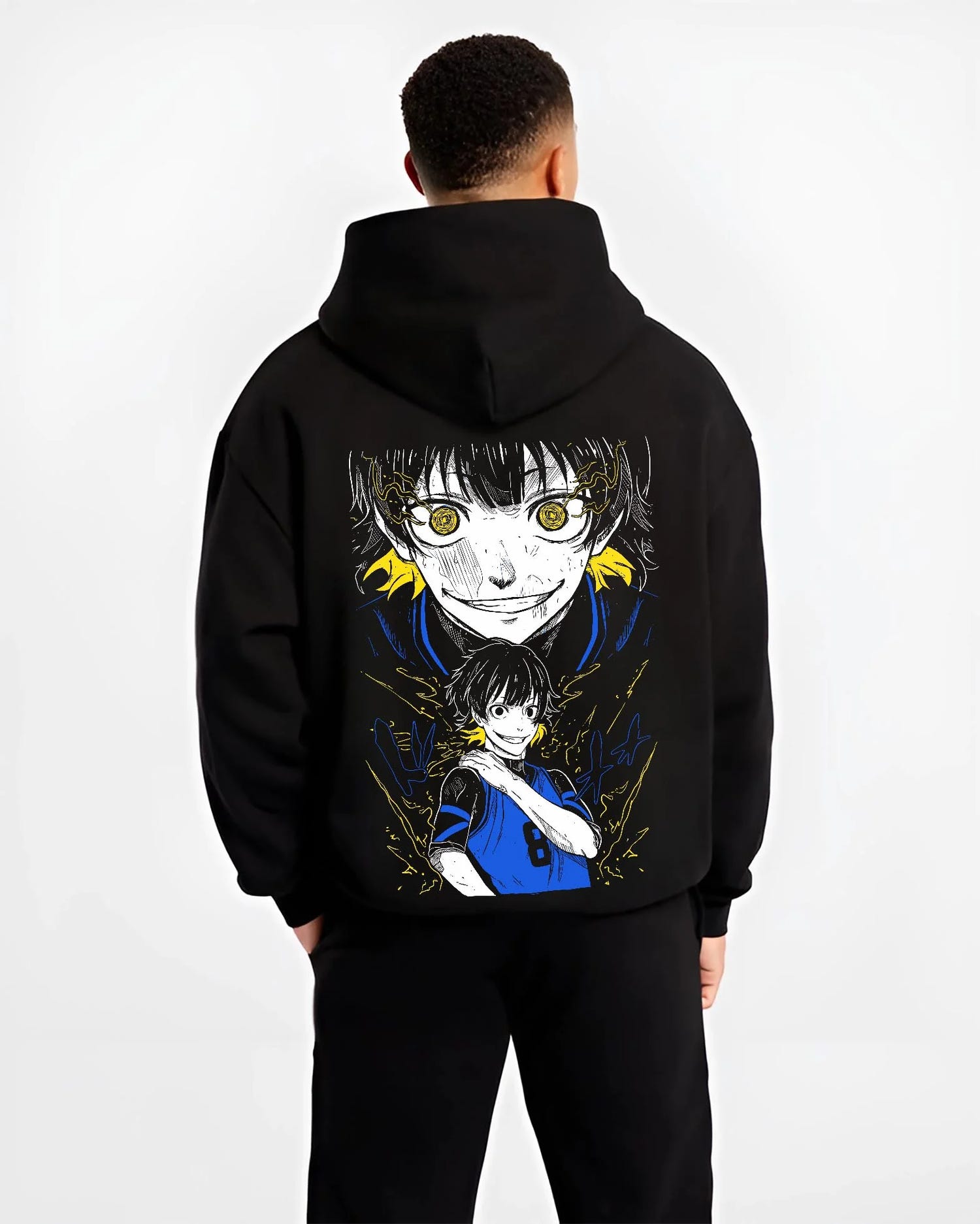Black hoodie worn by male model, back view with Bachi Hoodie Blue Lock Intense Yellow Eyes Stare Down graphic bold anime graphic.