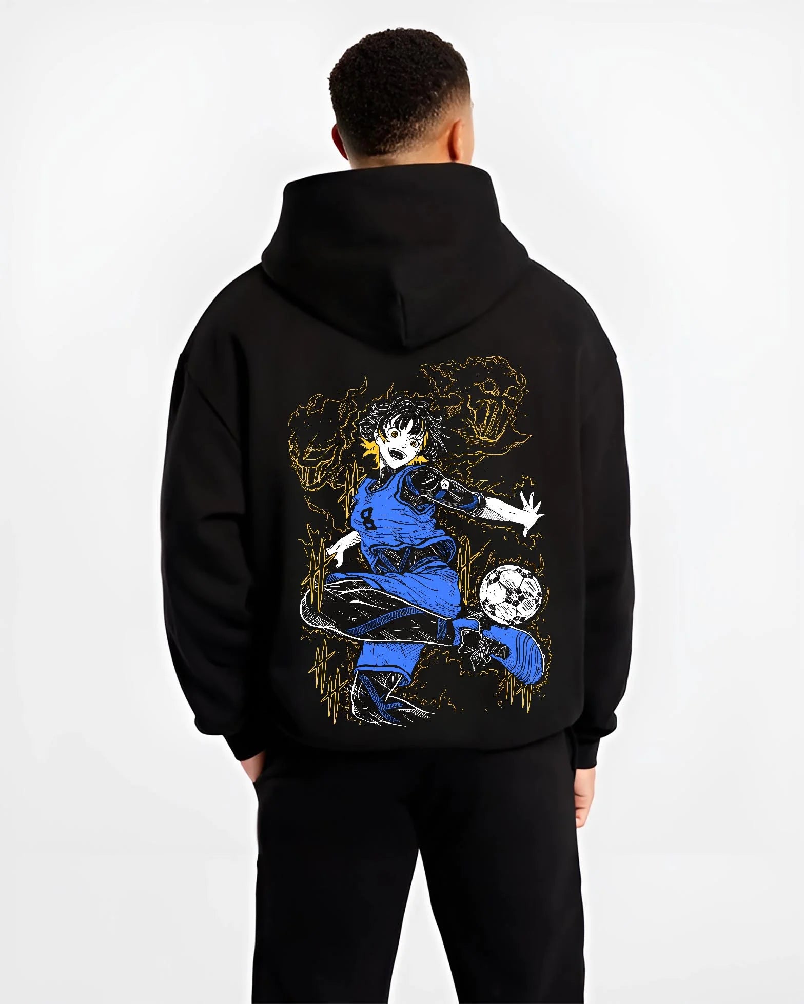 Black hoodie worn by male model, back view with Blue Lock Bachira Hoodie Dynamic Soccer Striker Jumper graphic streetwear graphic.