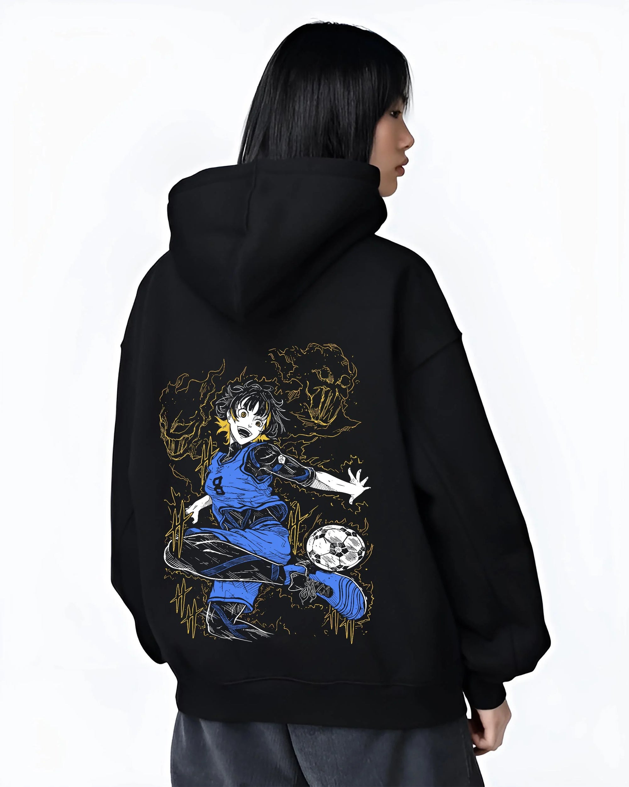 Black hoodie worn by female model, back view with Blue Lock Bachira Hoodie Dynamic Soccer Striker Jumper graphic premium wear.