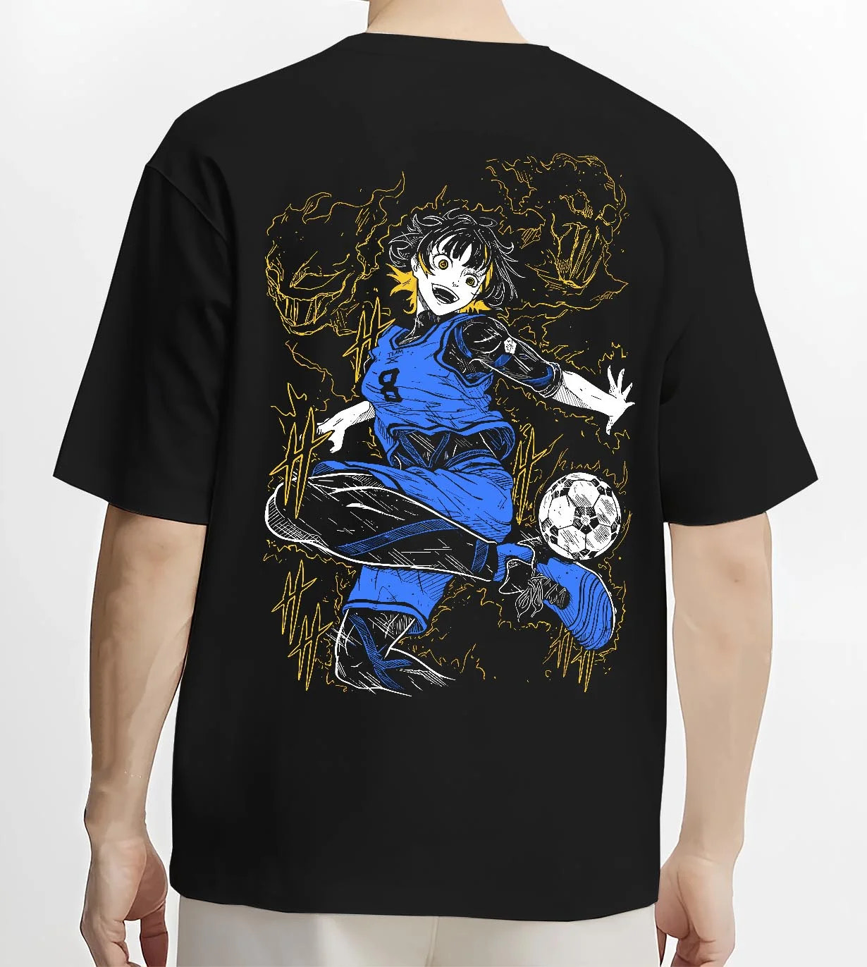 Black T-shirt worn by male model, back view with Blue Lock Bachira Hoodie Dynamic Soccer Striker Jumper graphic bold anime graphic.