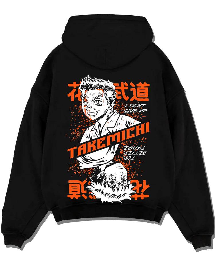Black hoodie laid flat featuring Baji Keisuke Tokyo Revengers street manga artwork with bold anime graphic print.