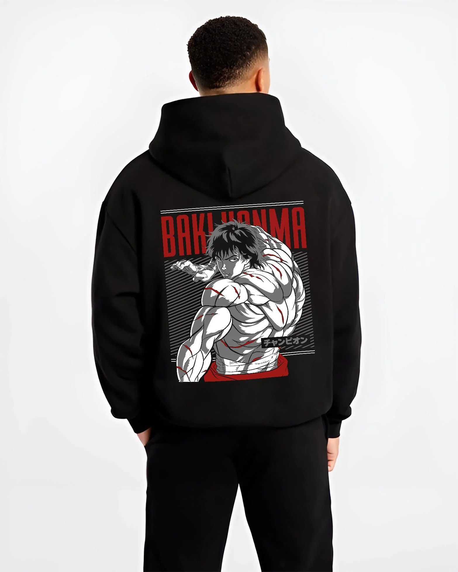 Black hoodie worn by male model, back view with Baki Hanma Hoodie Grappler Baki Martial Arts Fighter graphic streetwear graphic.