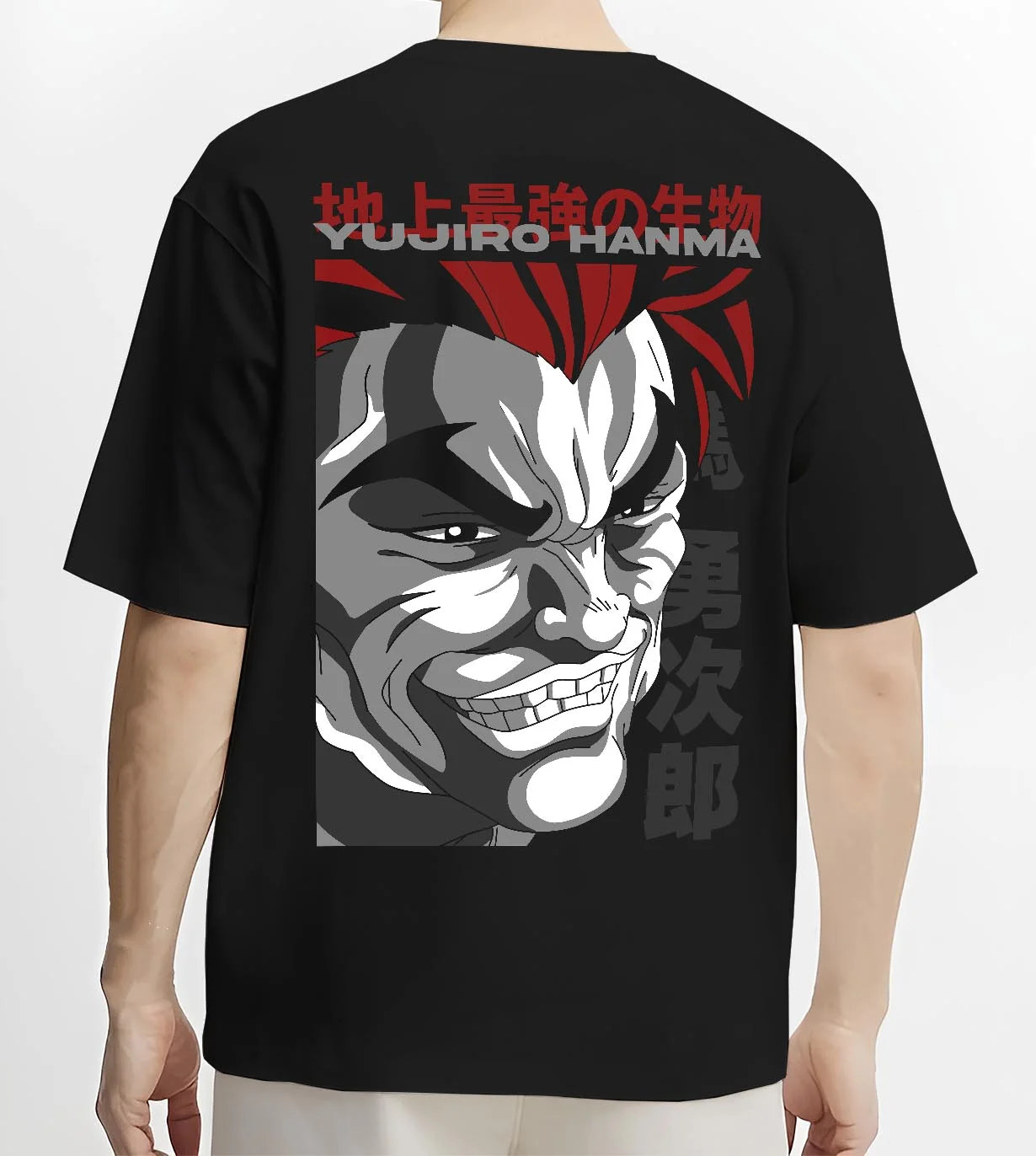 Black T-shirt worn by male model, back view with Yujiro Hanma Hoodie Baki the Grappler Fierce Grin graphic premium wear.