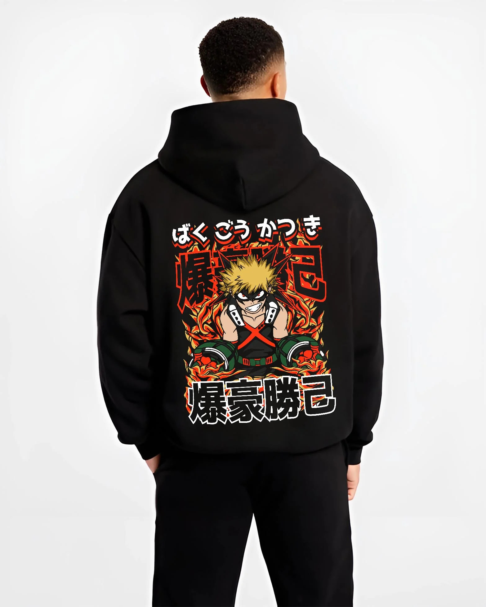 Black hoodie worn by male model, back view with Bakugo Explosion Hoodie My Hero Academia Blazing Rage graphic streetwear graphic.