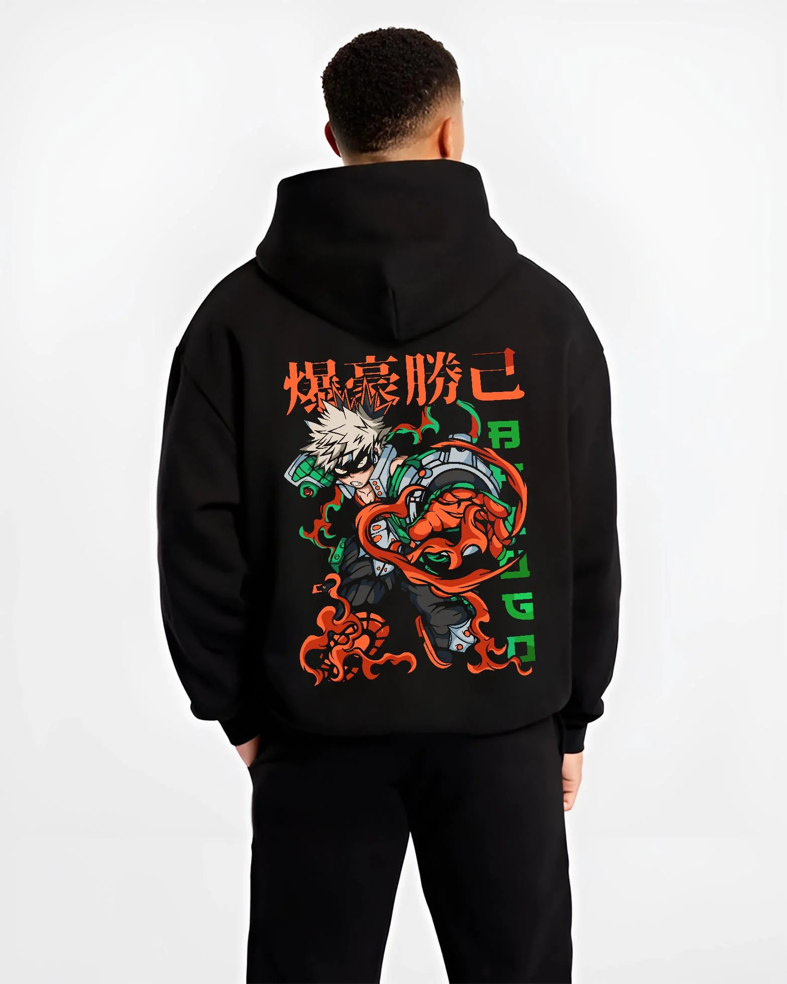 Black hoodie worn by male model, back view with Bakugo Power Hoodie My Hero Academia Inferno Battle graphic streetwear graphic.