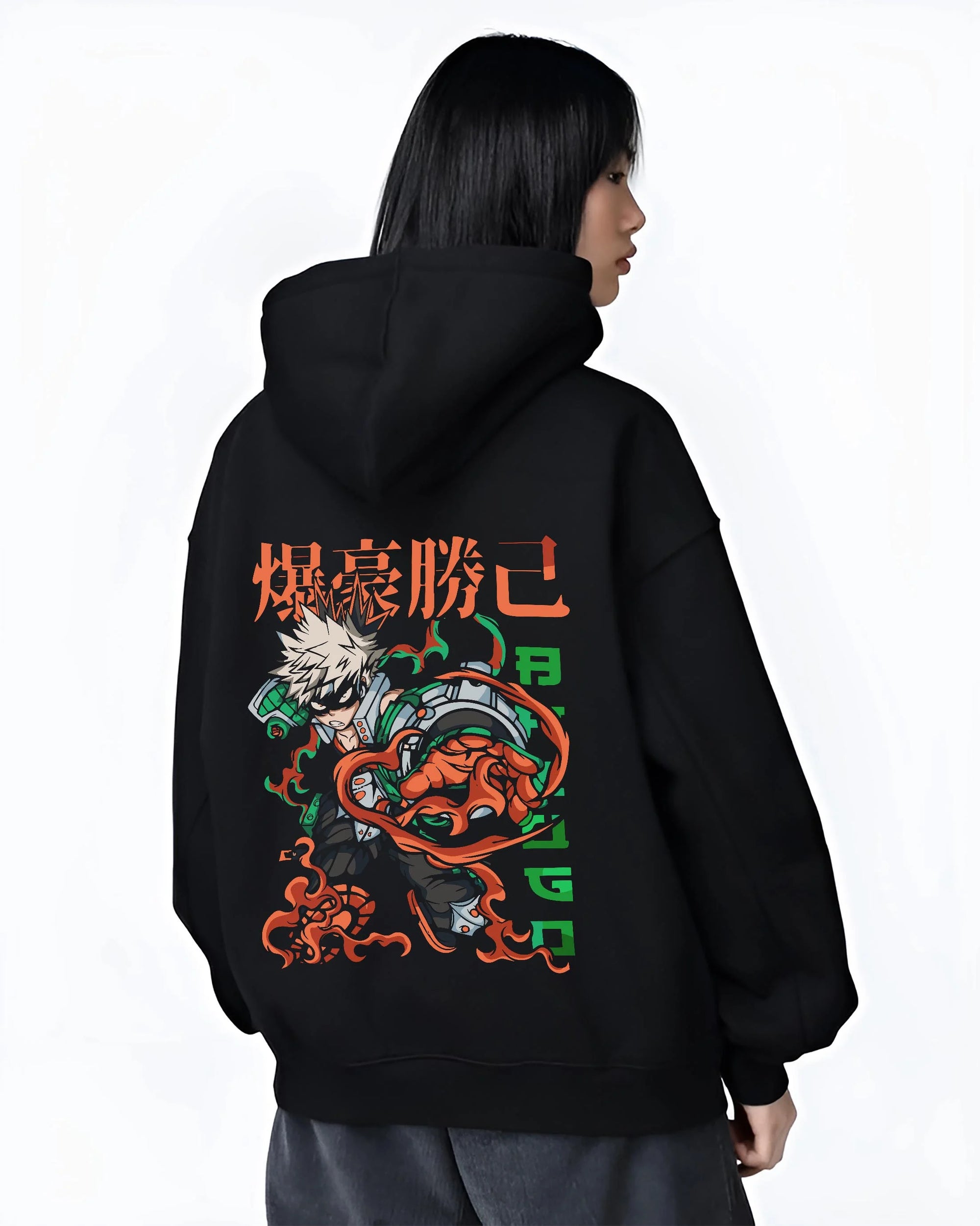 Black hoodie worn by female model, back view with Bakugo Power Hoodie My Hero Academia Inferno Battle graphic streetwear graphic.