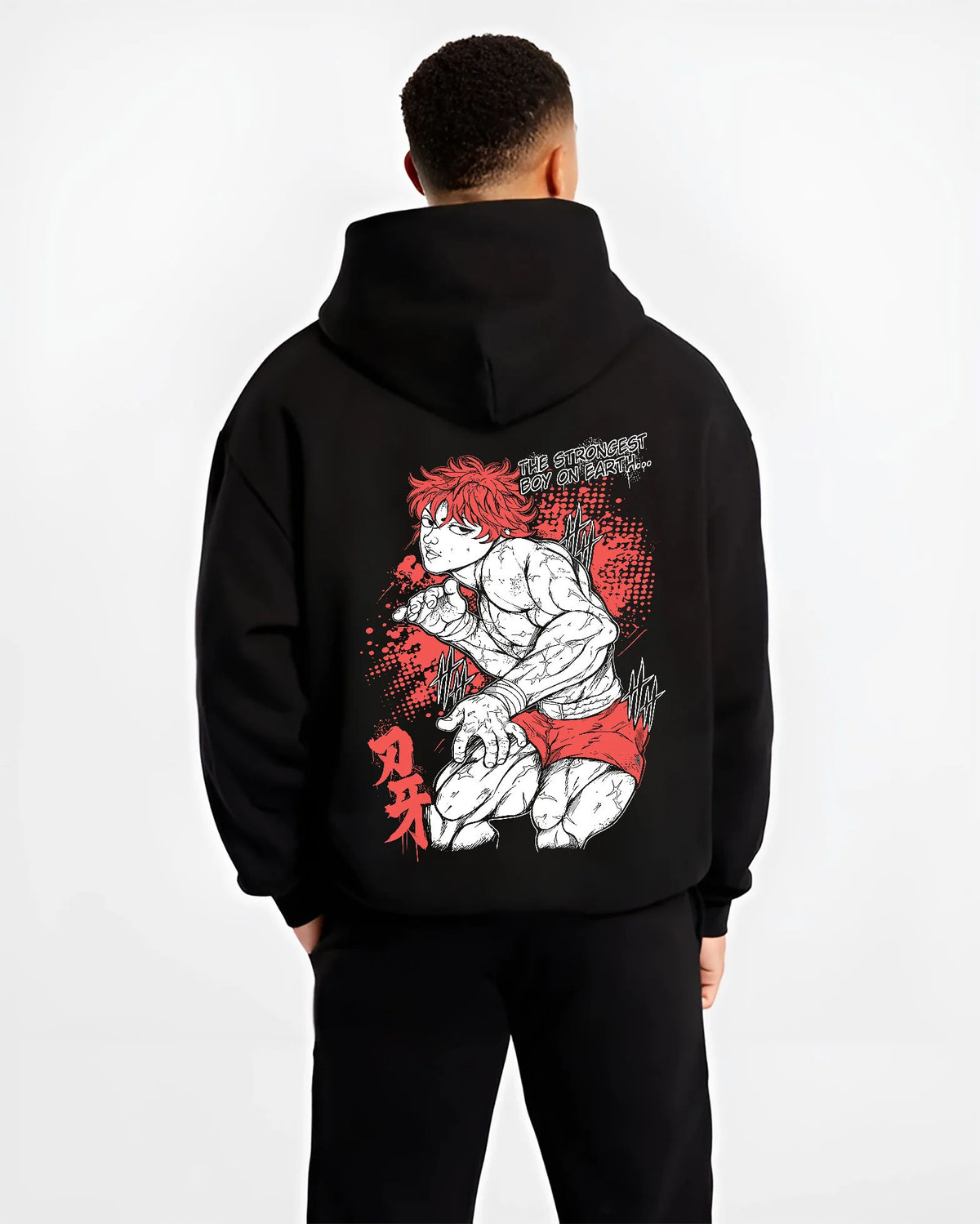 Black hoodie model back view showing Baki Hanma: crouched fighting pose