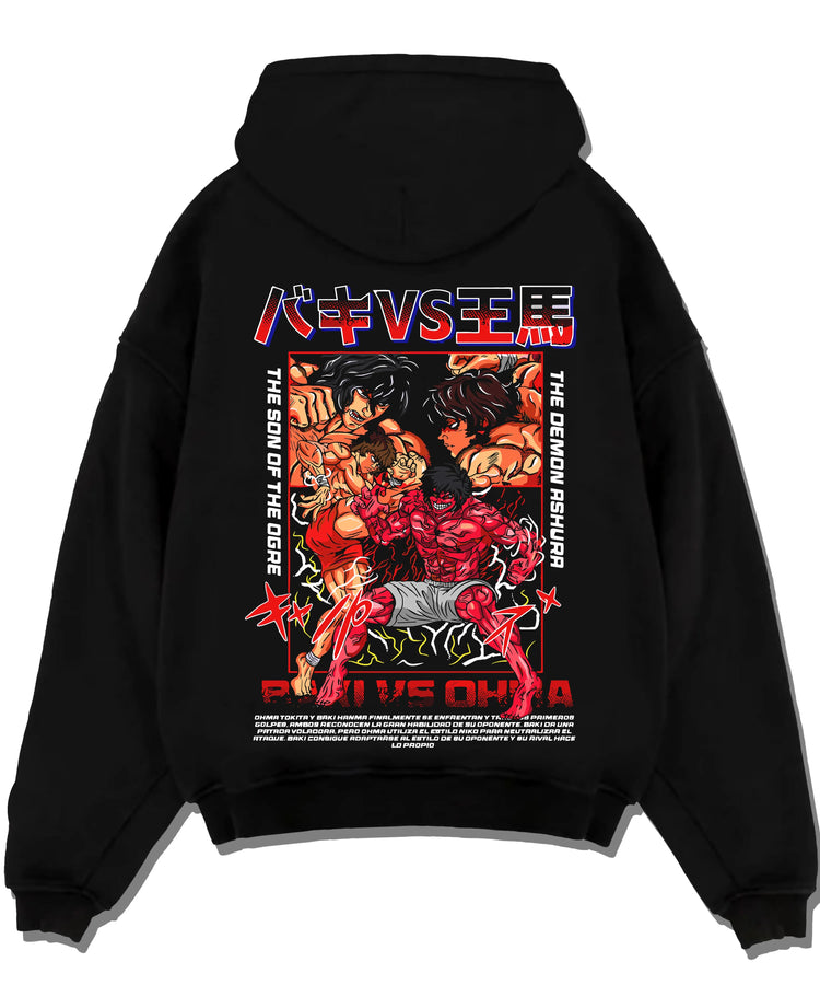 Black pullover hoodie laid flat with Baki vs Ohma Hoodie Baki Hanma Kengan Ashura Showdown graphic bold anime graphic.