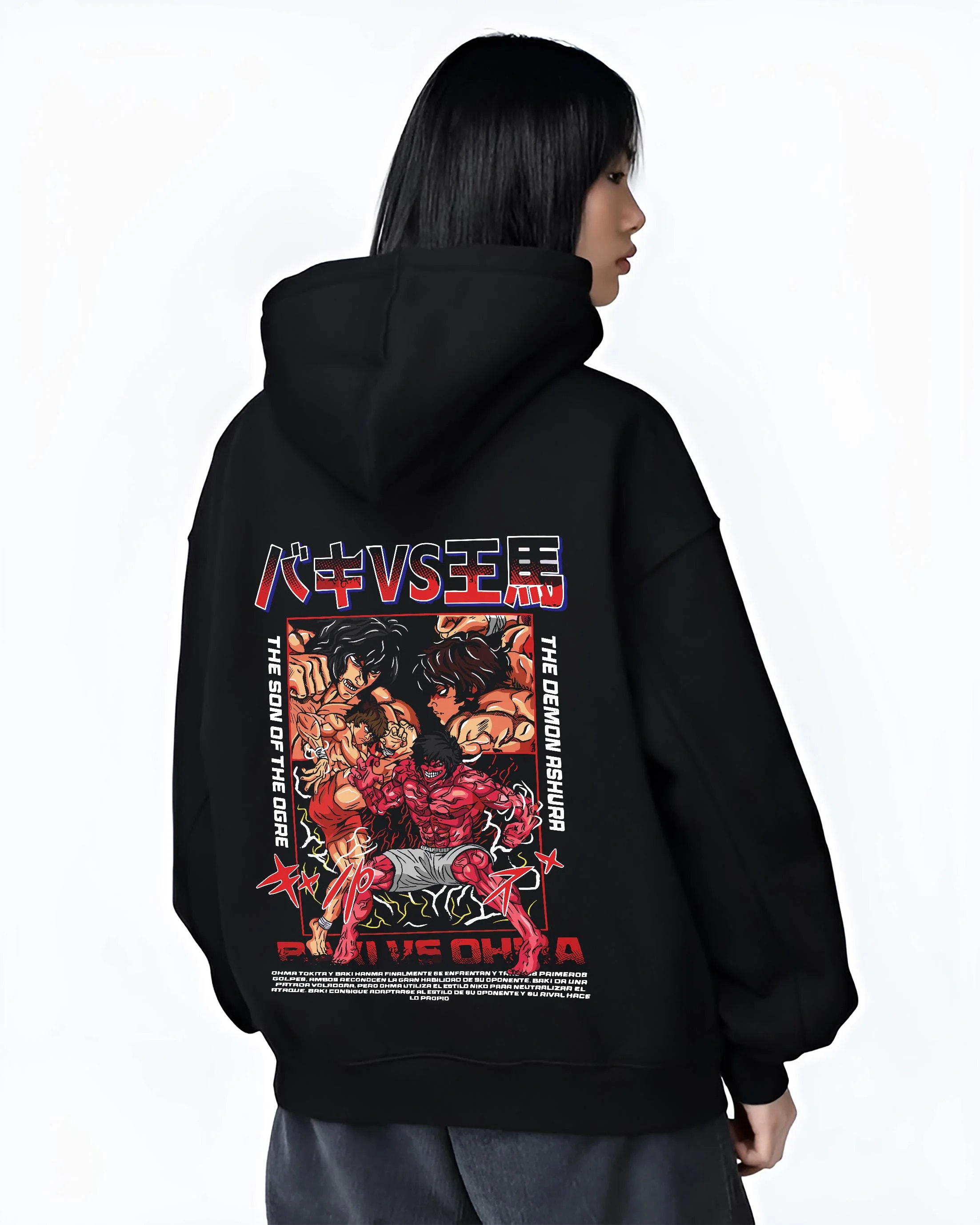 Black hoodie worn by female model, back view with Baki vs Ohma Hoodie Baki Hanma Kengan Ashura Showdown graphic premium wear.