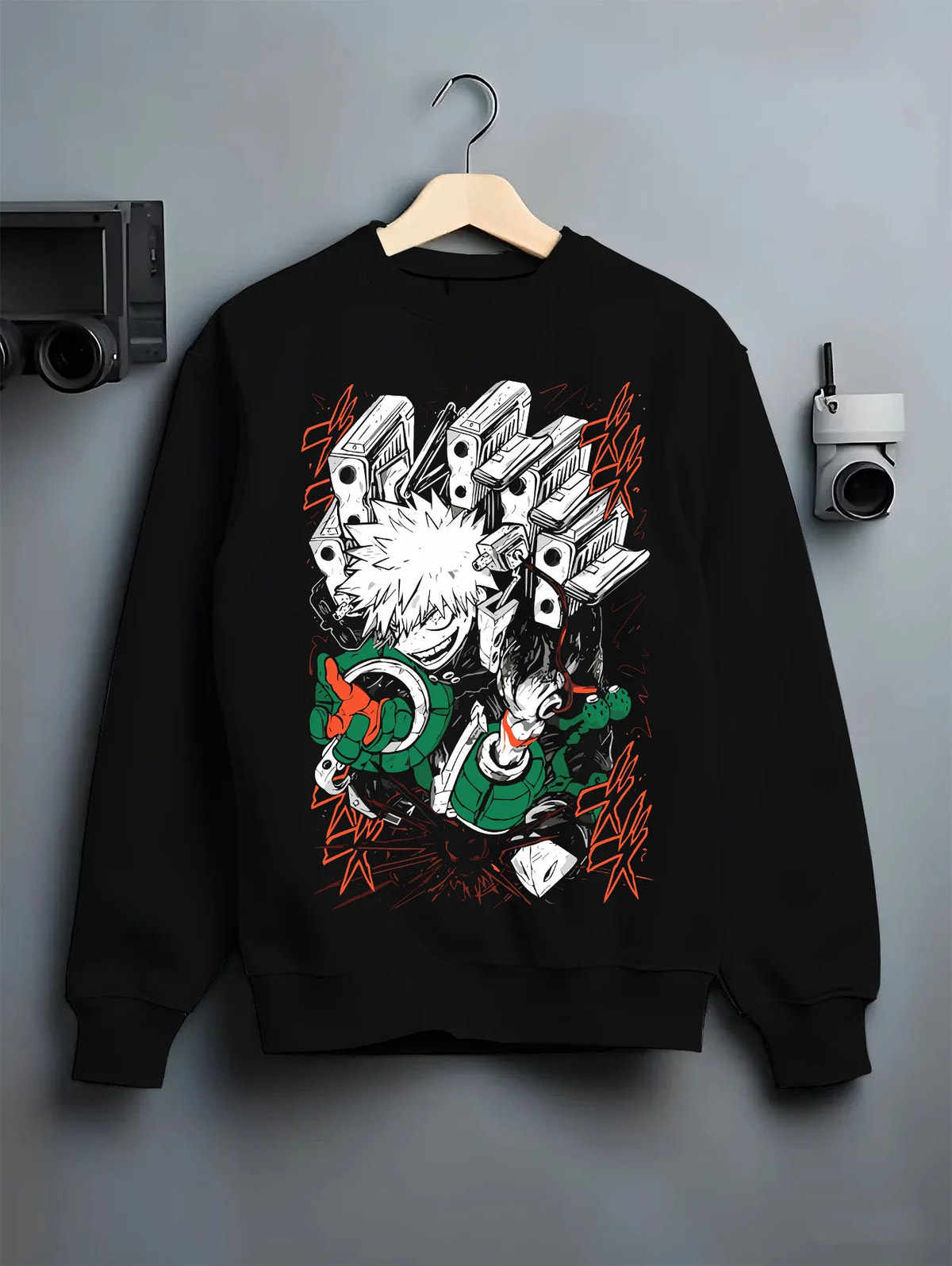 Black crewneck sweatshirt on hanger showing Katsuki Bakugo from My Hero Academia: hero costume, action