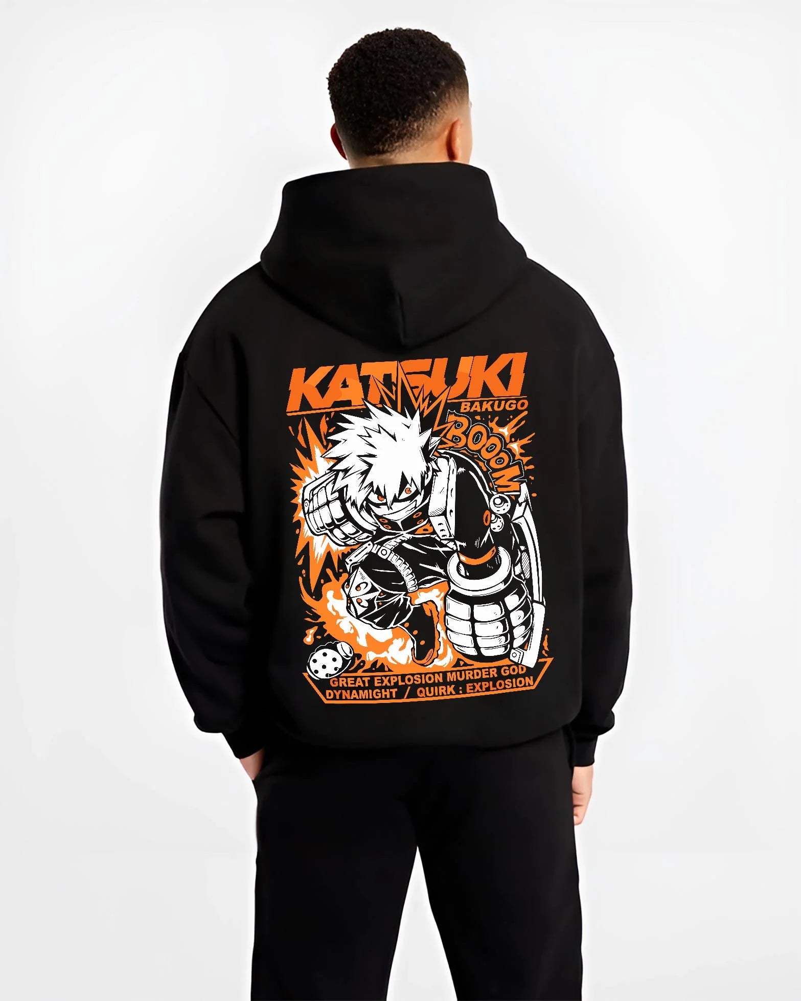 Black hoodie worn by male model, back view with Bakugo Dynamight Hoodie My Hero Academia Quirk Power graphic bold anime graphic.