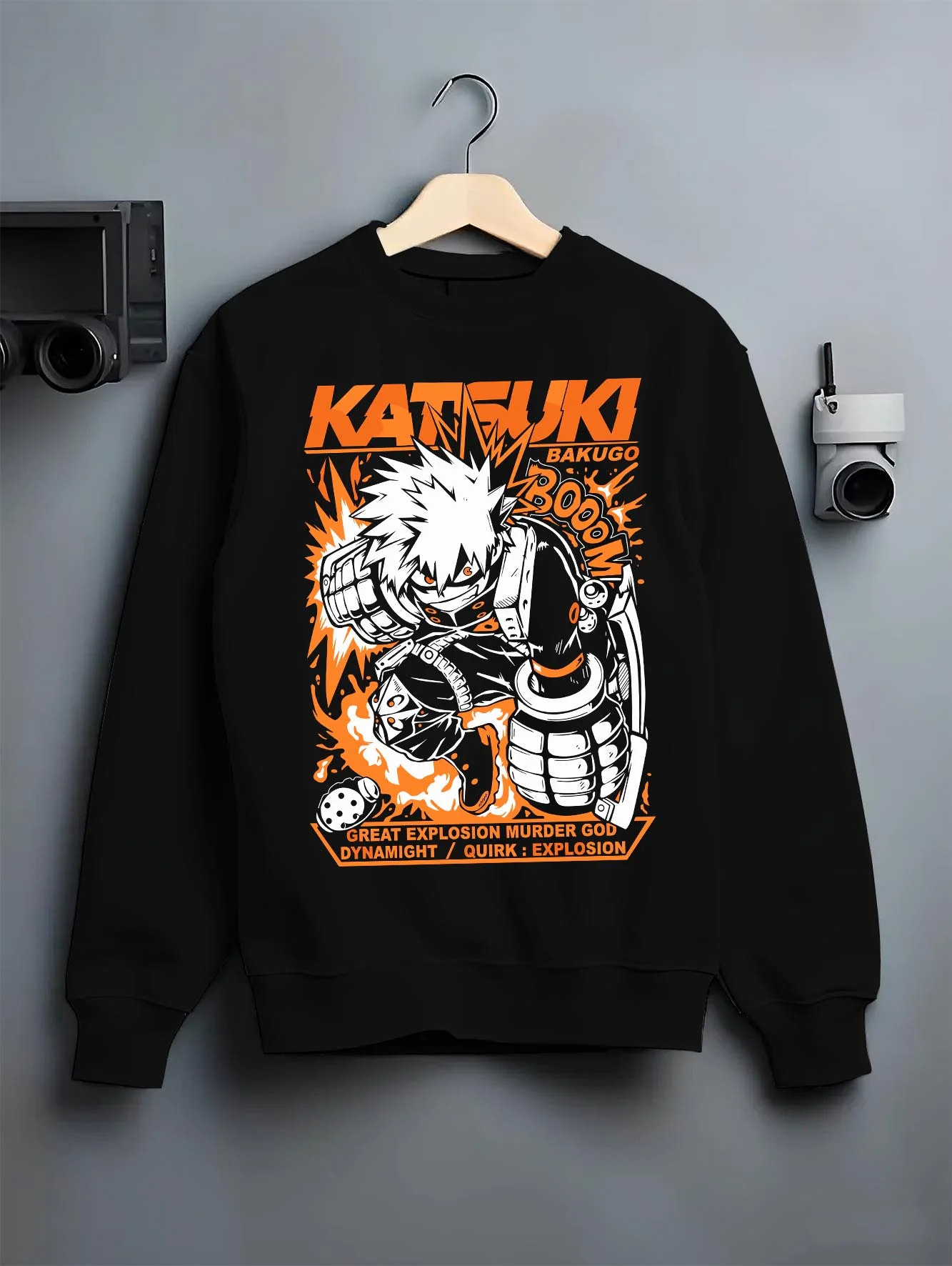 Black crewneck sweatshirt on hanger with Bakugo Dynamight Hoodie My Hero Academia Quirk Power graphic streetwear graphic.
