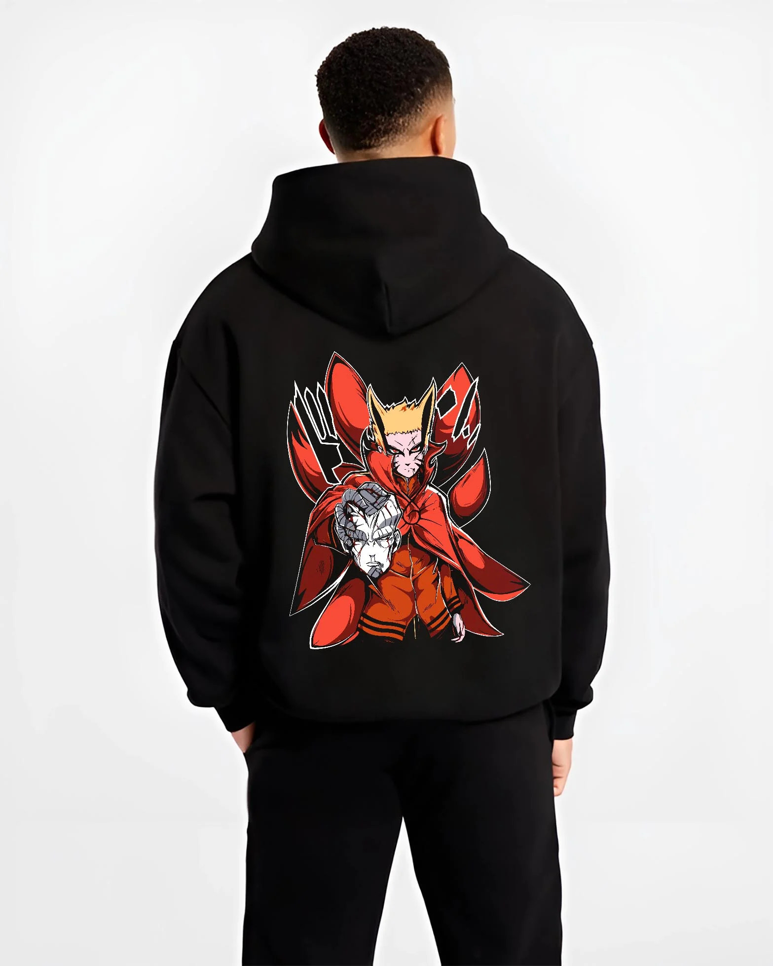 Black hoodie worn by male model, back view with Naruto Uzumaki Hoodie Baryon Mode Battle Jumper graphic premium wear.