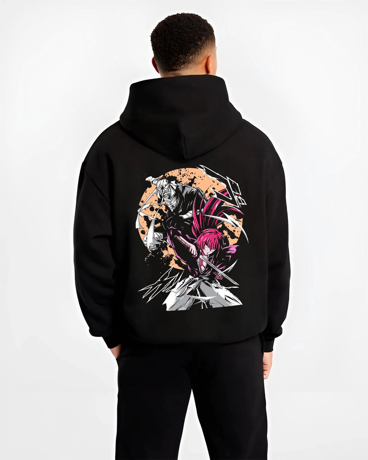 Black hoodie worn by male model from the back featuring Toshiro Hitsugaya Bleach battle slash artwork.