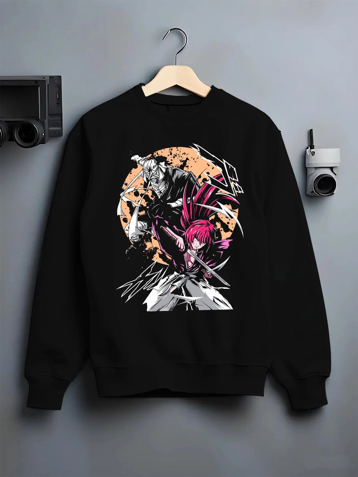 Black crewneck sweatshirt on hanger featuring Toshiro Hitsugaya Bleach battle slash artwork.
