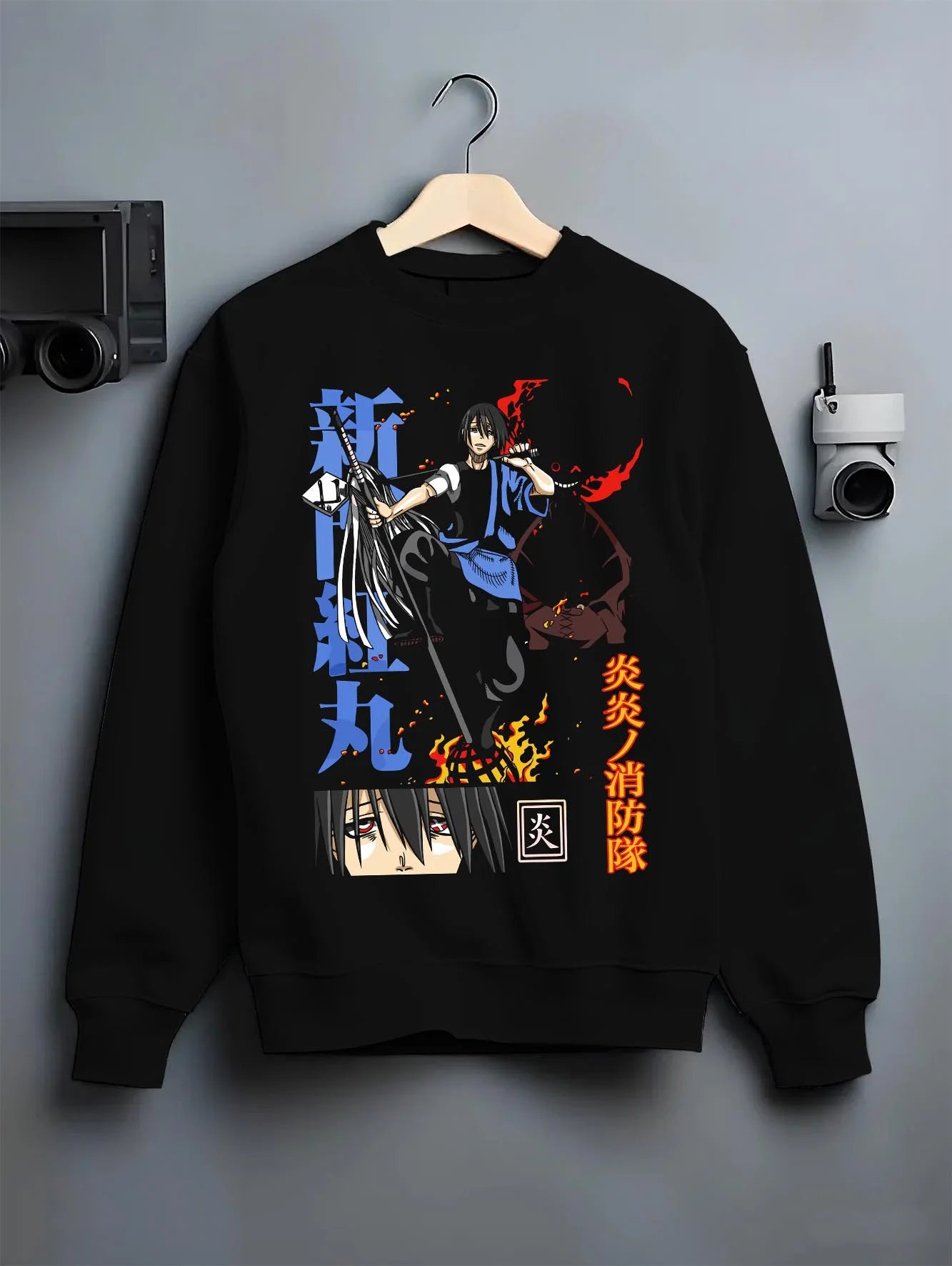 Black crewneck sweatshirt on hanger with Enma Kozato Hoodie Katekyo Hitman Reborn Blue Flames graphic premium wear.
