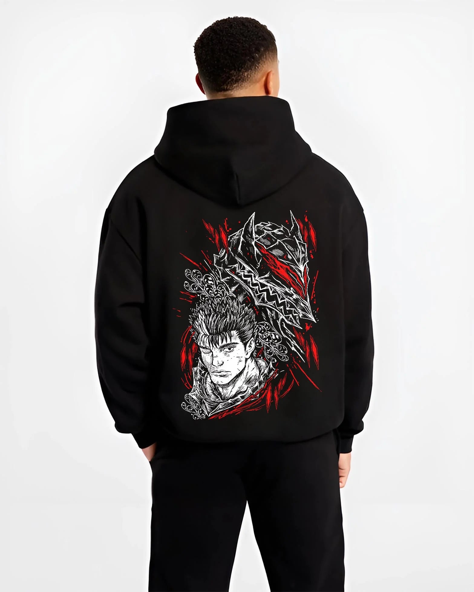 Black hoodie worn by male model, back view with Guts Berserk Hoodie Eclipse Skull Knight Dark Battle graphic Guts anime design.