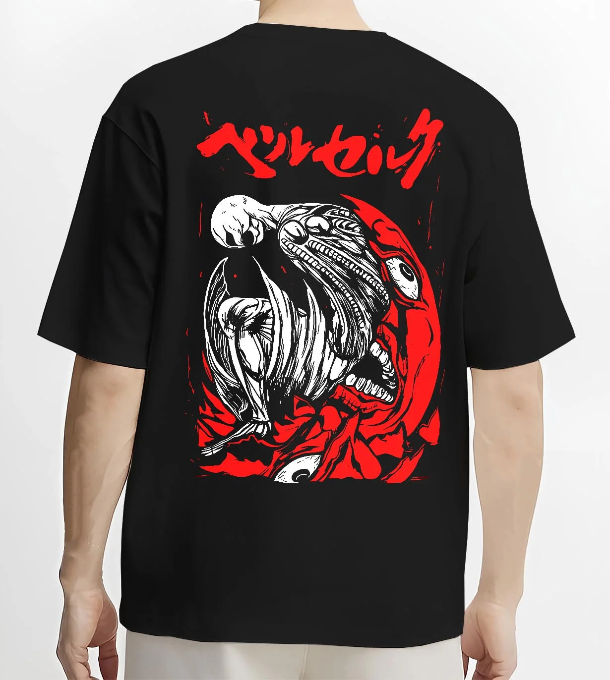 Black T-shirt worn by male model, back view with Berserk Skull Hoodie Behelit Eclipse Bloody Crimson graphic bold anime graphic.