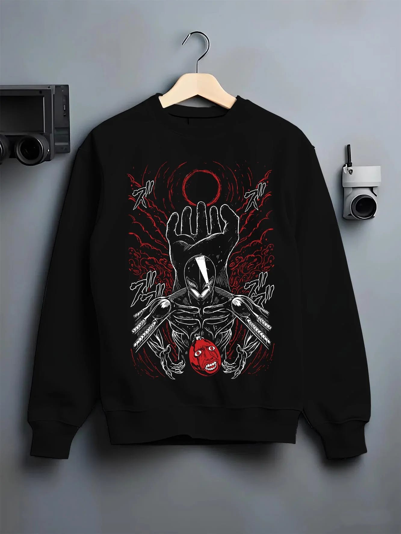 Black crewneck sweatshirt on hanger with Berserk Eclipse Hoodie Crimson Hand of God Eclipse graphic streetwear graphic.