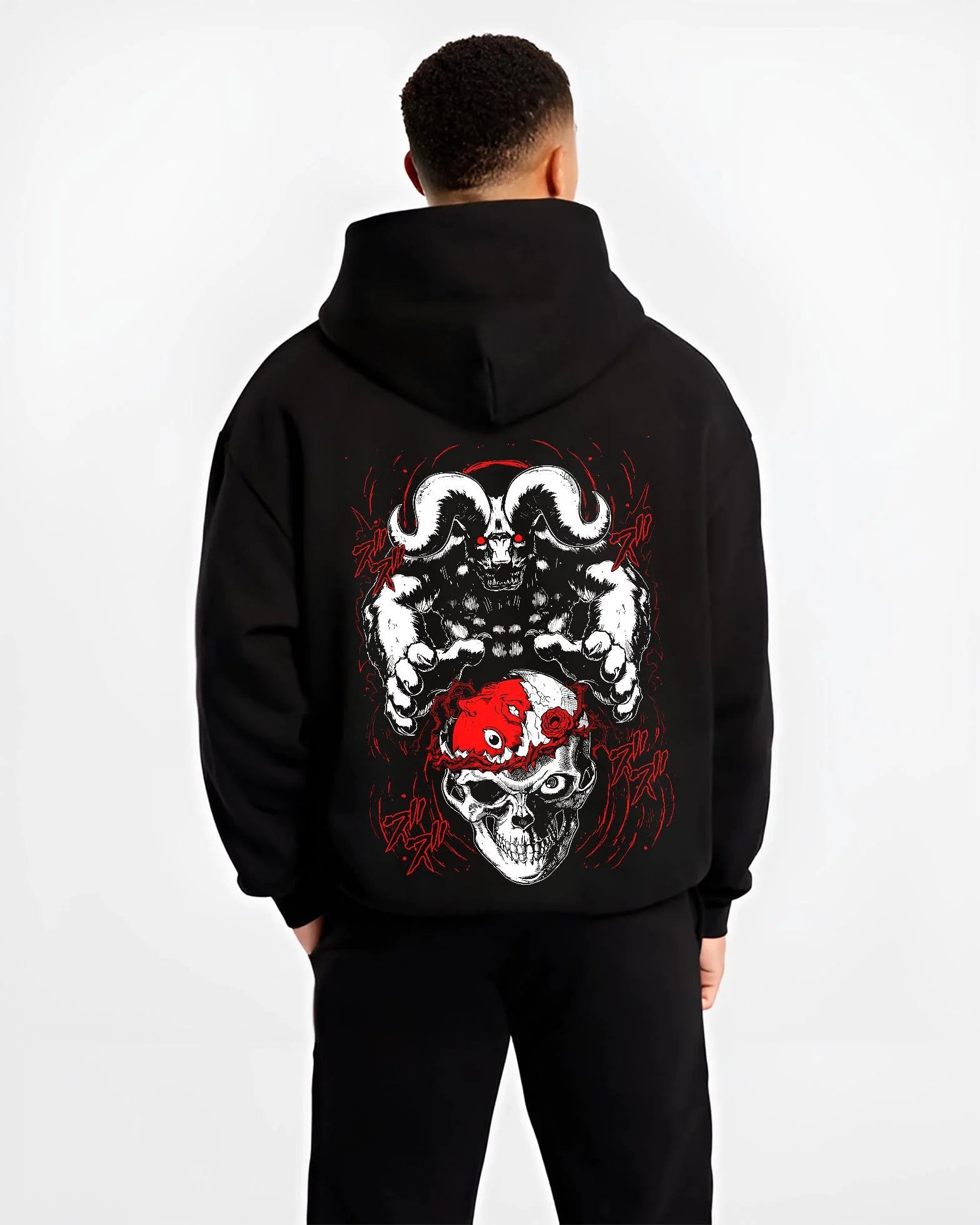 Black hoodie worn by male model, back view with Berserk Behelit Hoodie Skull Eclipse Red Mark Power graphic streetwear graphic.