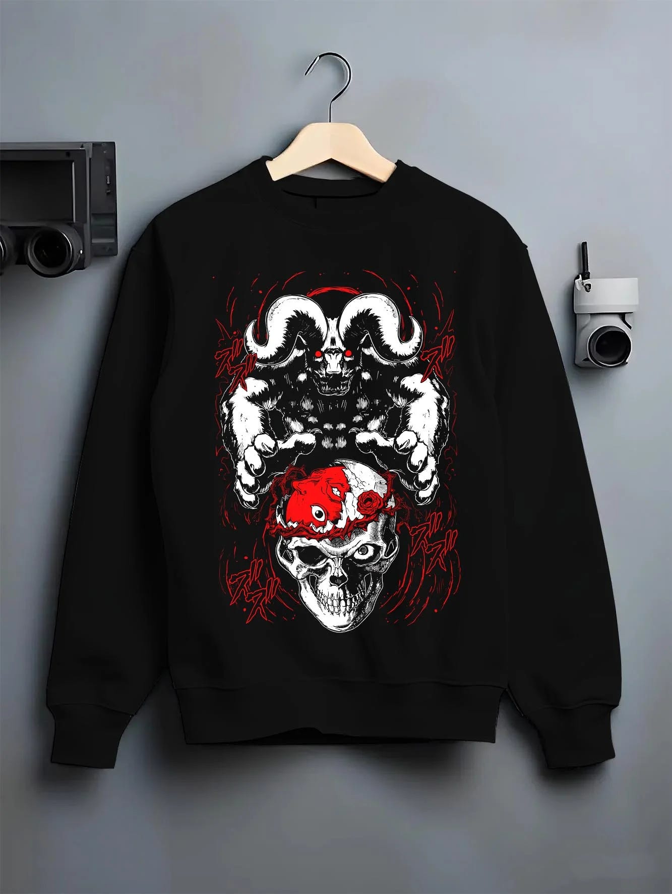 Black crewneck sweatshirt on hanger with Berserk Behelit Hoodie Skull Eclipse Red Mark Power graphic premium wear.