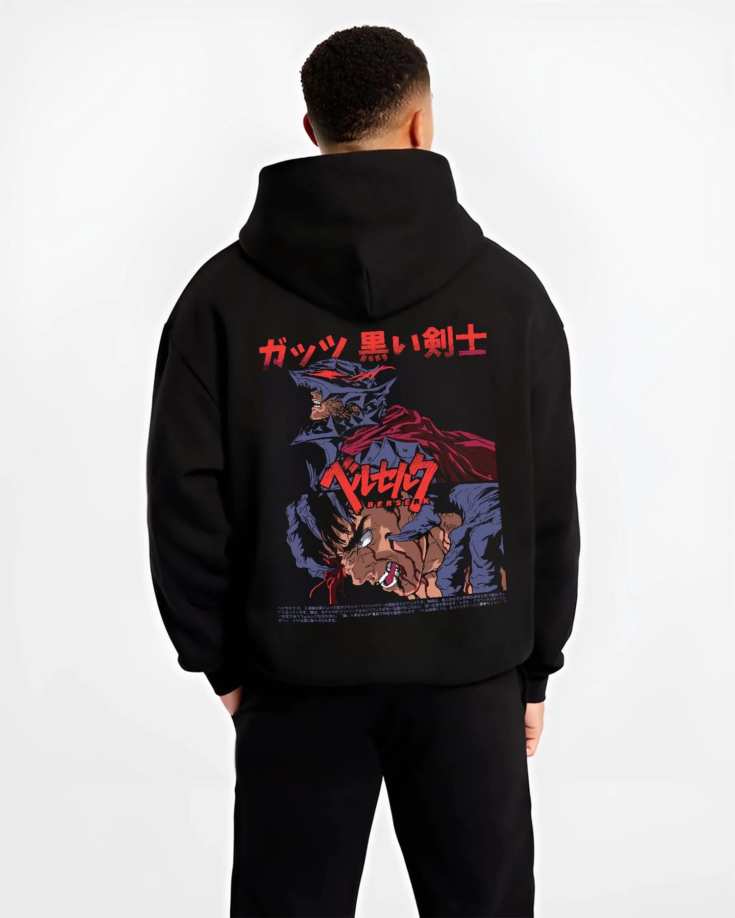 Black hoodie worn by male model, back view with Berserk Guts Hoodie Dark Swordsman Bloody Poster graphic bold anime graphic.