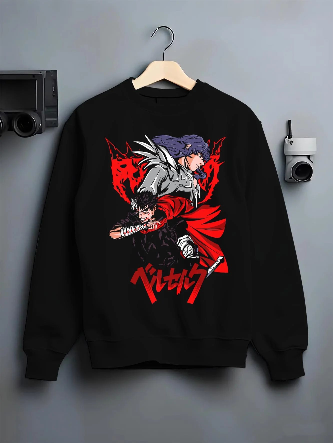 Black crewneck sweatshirt on hanger with Guts vs Griffith Hoodie Berserk Bloody Sword Battle graphic streetwear graphic.