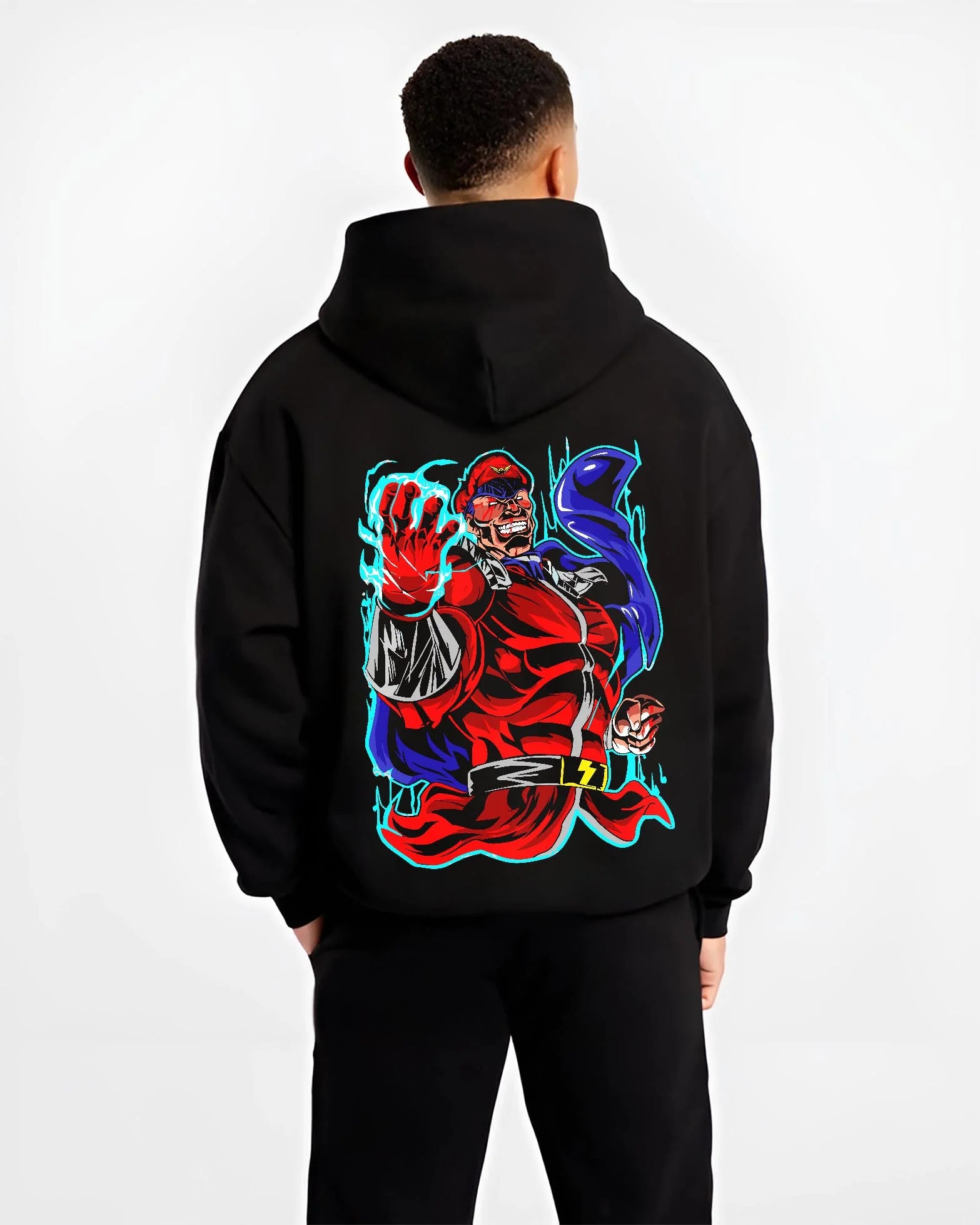 Black hoodie worn by male model, back view with M. Bison Hoodie Street Fighter Red Aura Flame Power graphic bold anime graphic.