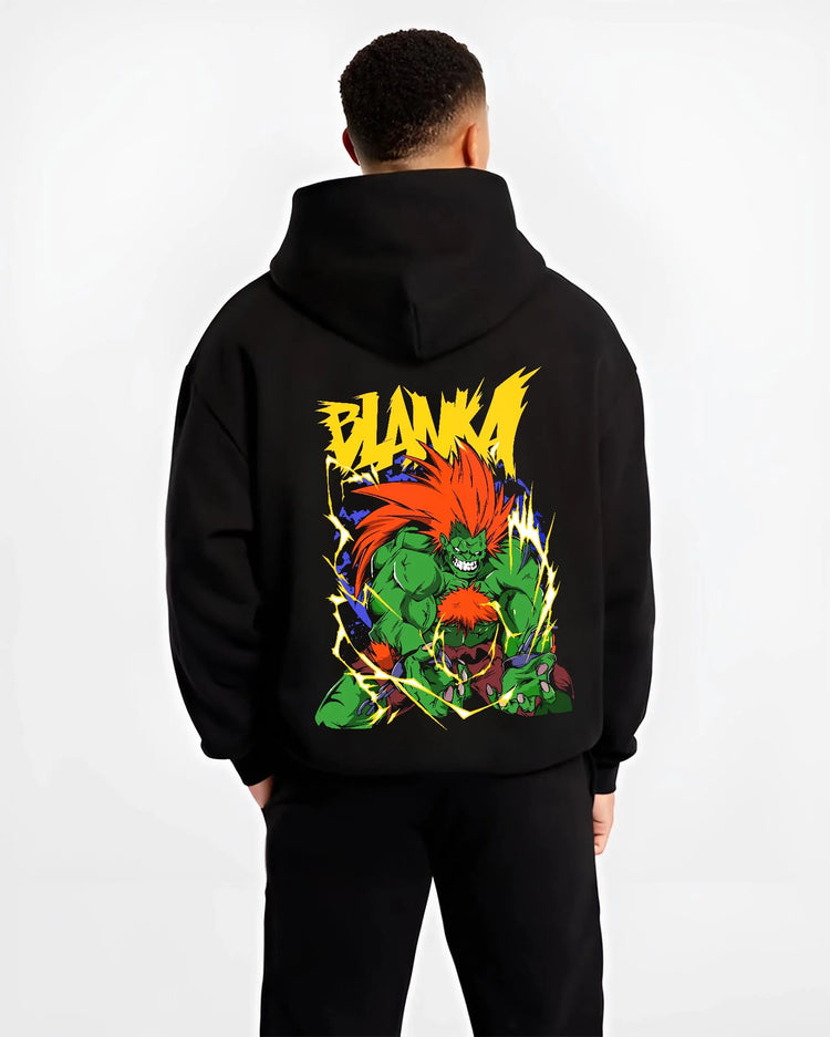 Black hoodie worn by male model, back view with Blanka Hoodie Street Fighter Green Beast Retro Roar graphic Blanka anime design.
