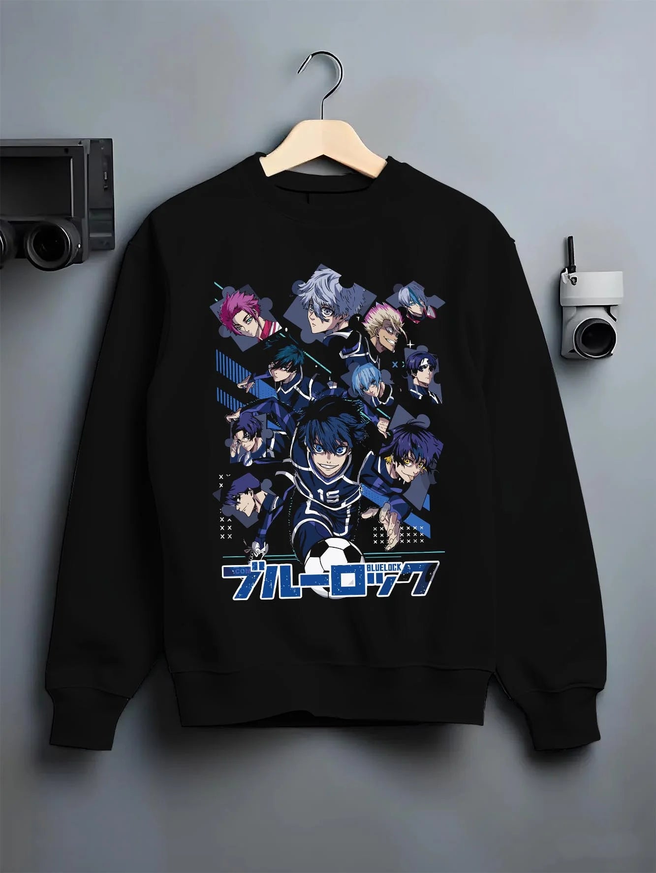 Black crewneck sweatshirt on hanger with Blue Lock Hoodie Team Eleven Anime Sports Panel Print graphic premium wear.