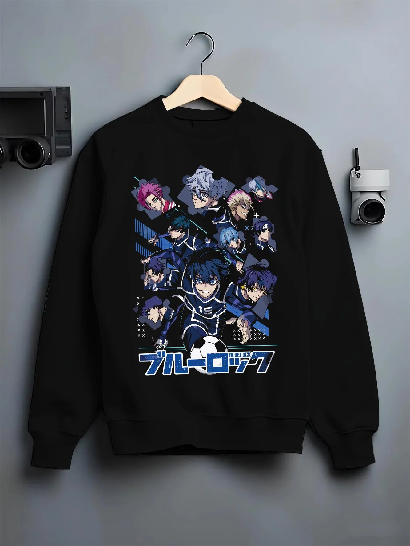 Black crewneck sweatshirt on hanger with Blue Lock Hoodie Team Eleven Anime Sports Panel Print graphic premium wear.