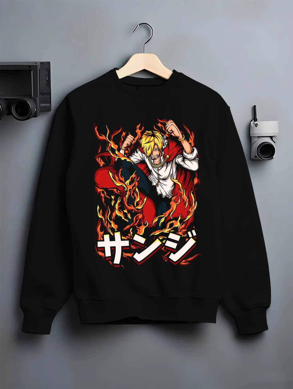 Black crewneck sweatshirt on hanger featuring Sanji Black Leg One Piece fiery kick artwork.