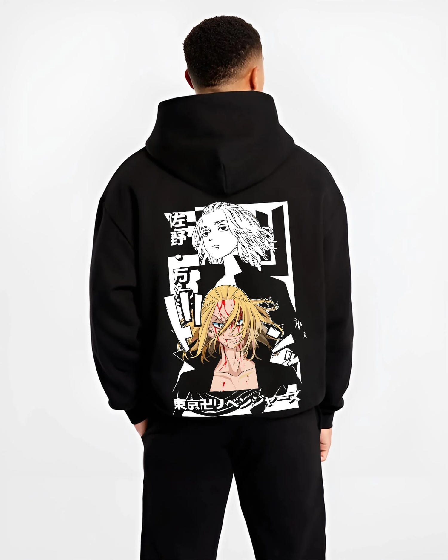 Black hoodie worn by male model, back view with Tokyo Revengers Hoodie Manjiro Sano Blonde Leader graphic bold anime graphic.