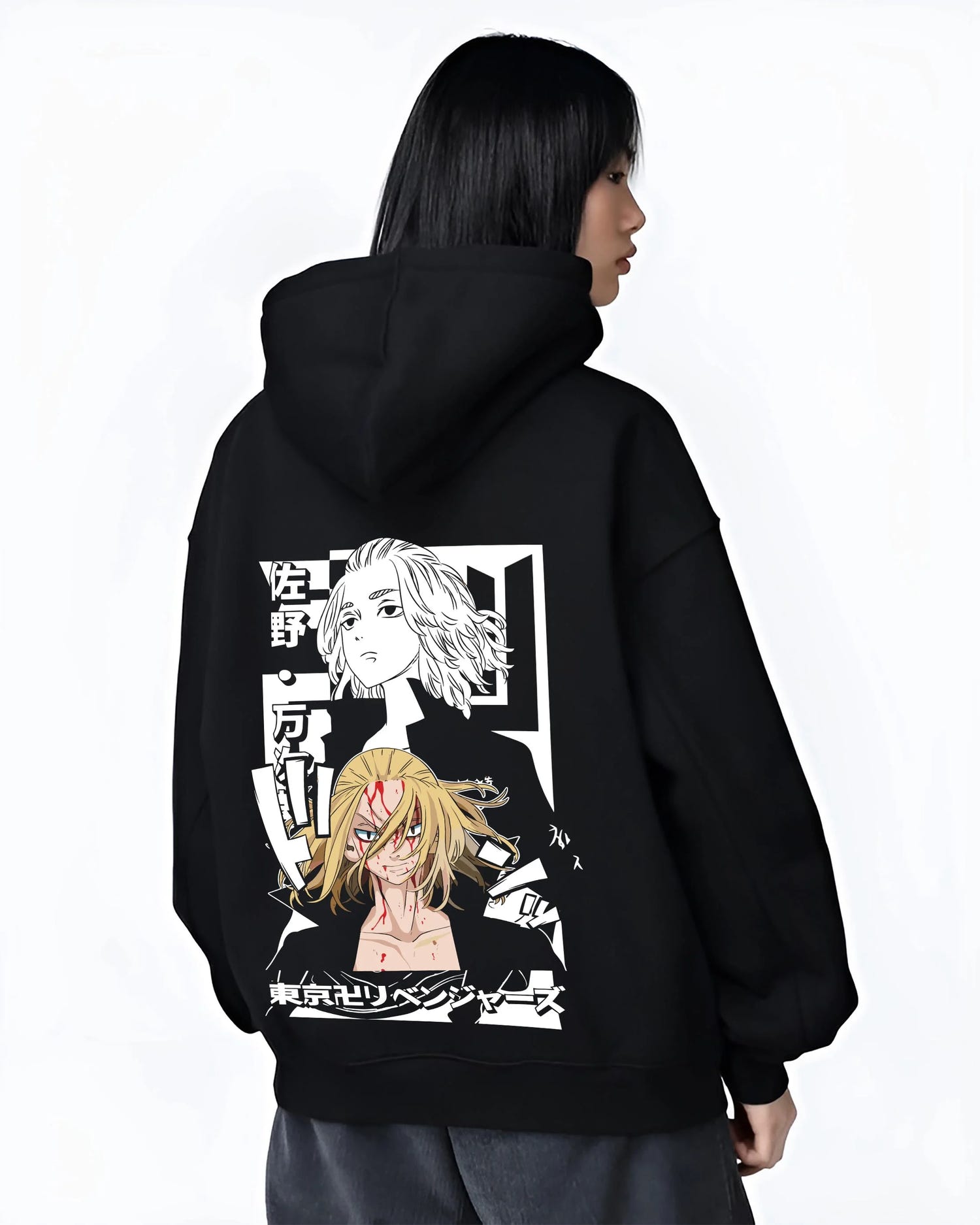 Black hoodie worn by female model, back view with Tokyo Revengers Hoodie Manjiro Sano Blonde Leader graphic bold anime graphic.
