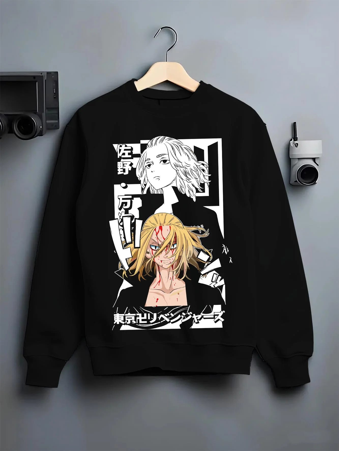 Black crewneck sweatshirt on hanger with Tokyo Revengers Hoodie Manjiro Sano Blonde Leader graphic streetwear graphic.