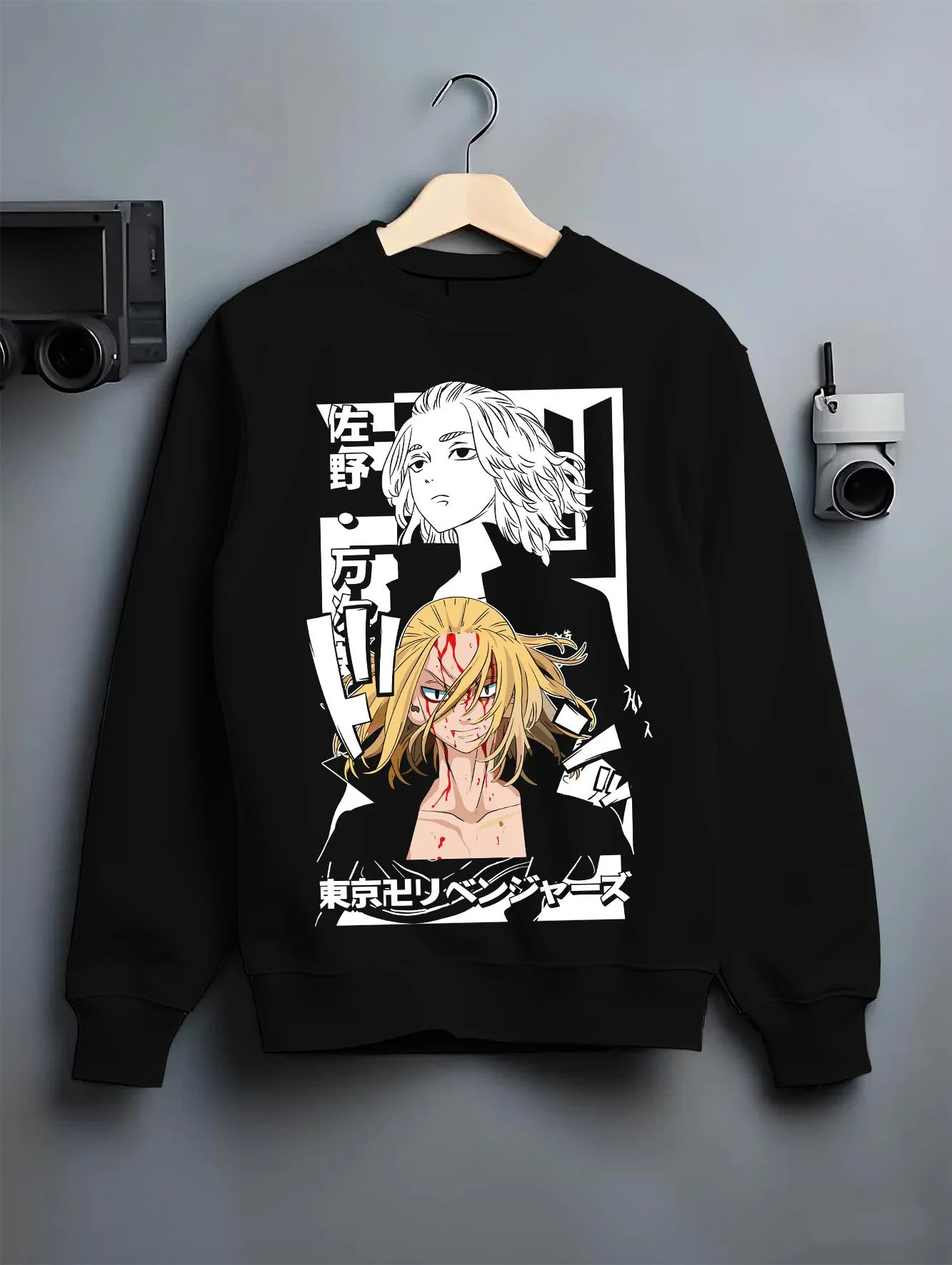 Black crewneck sweatshirt on hanger with Tokyo Revengers Hoodie Manjiro Sano Blonde Leader graphic streetwear graphic.