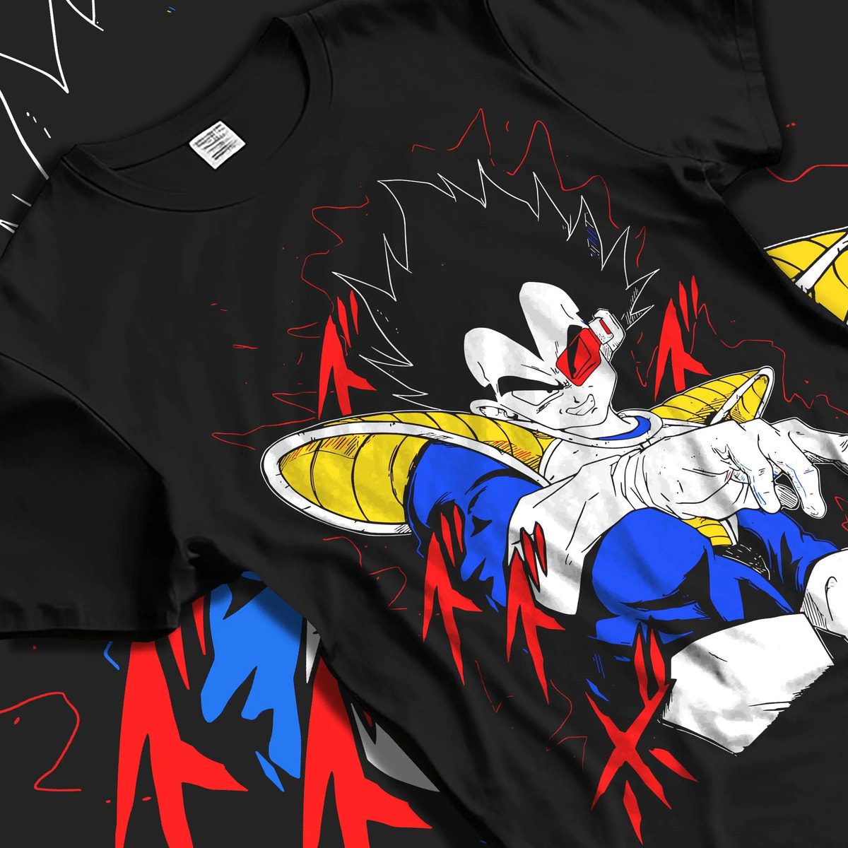 Black T-shirt laid flat with natural folds featuring Vegeta Dragon Ball Saiyan armour artwork.
