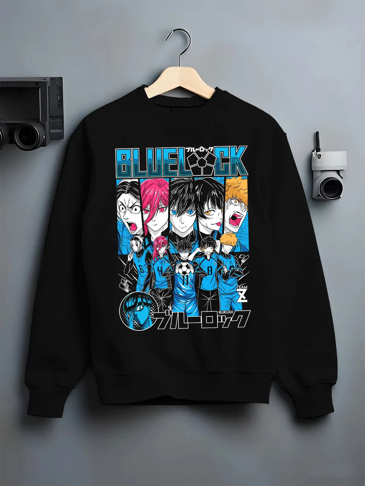 Black crewneck sweatshirt on hanger showing Blue Lock: ensemble including Isagi and Bachira