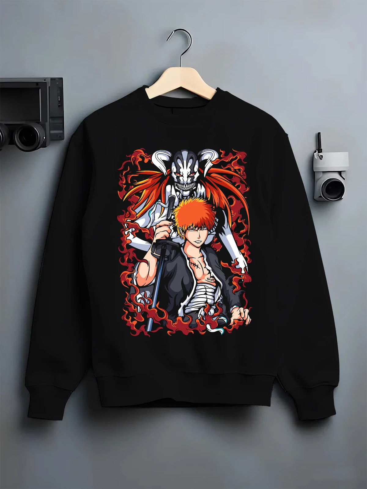 Black crewneck sweatshirt on hanger with Ichigo Kurosaki with Hollow form from Bleach illustrated back graphic