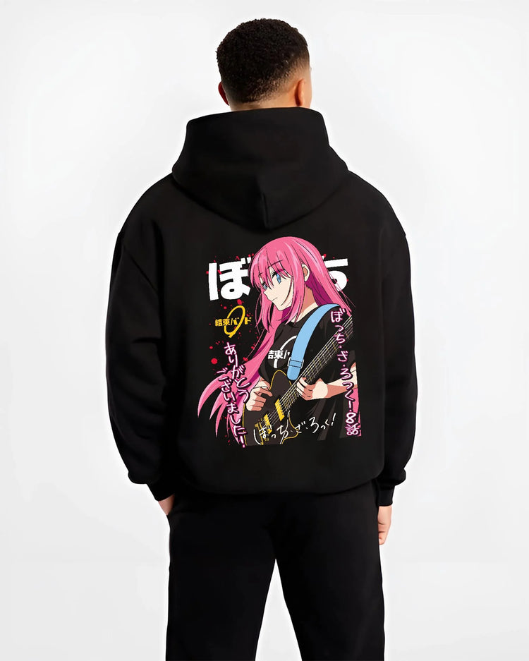 Black hoodie worn by male model, back view with Bocchi the Rock Hoodie Anime Guitar Shy Idol Scene graphic Bocchi anime design.