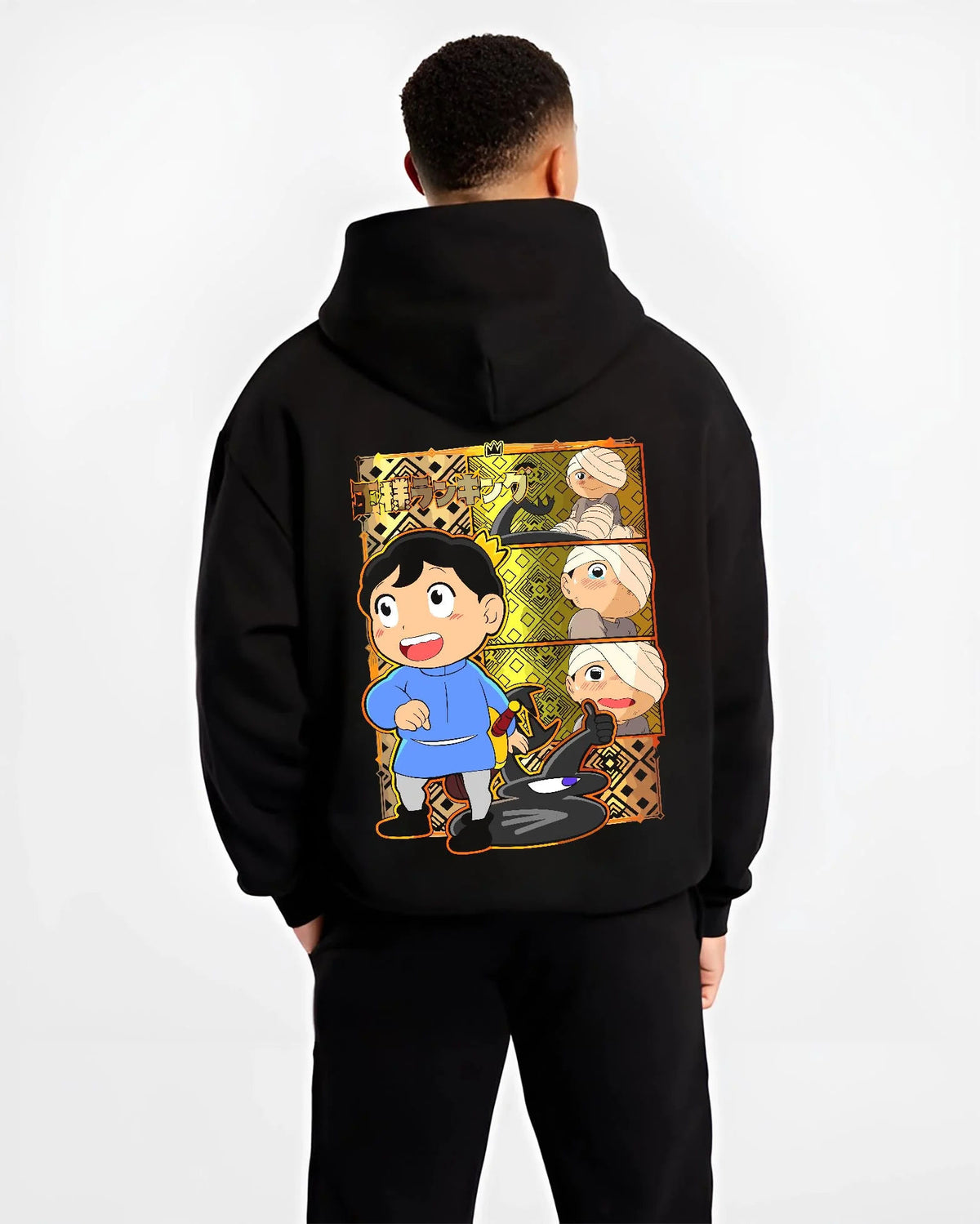 Black hoodie worn by male model from the back featuring Bojji and Kage Ranking of Kings artwork.