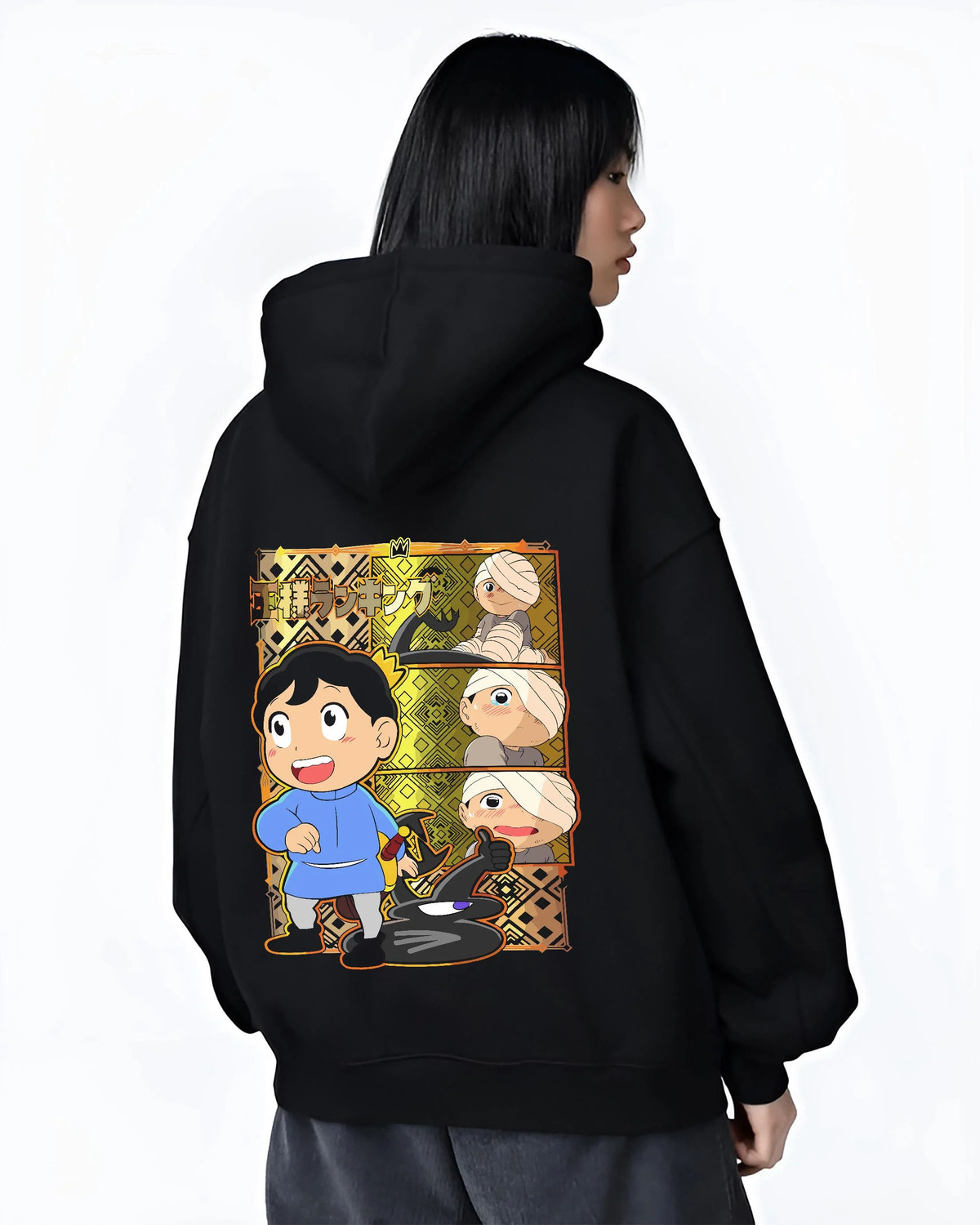 Black hoodie worn by female model from the back featuring Bojji and Kage Ranking of Kings artwork.
