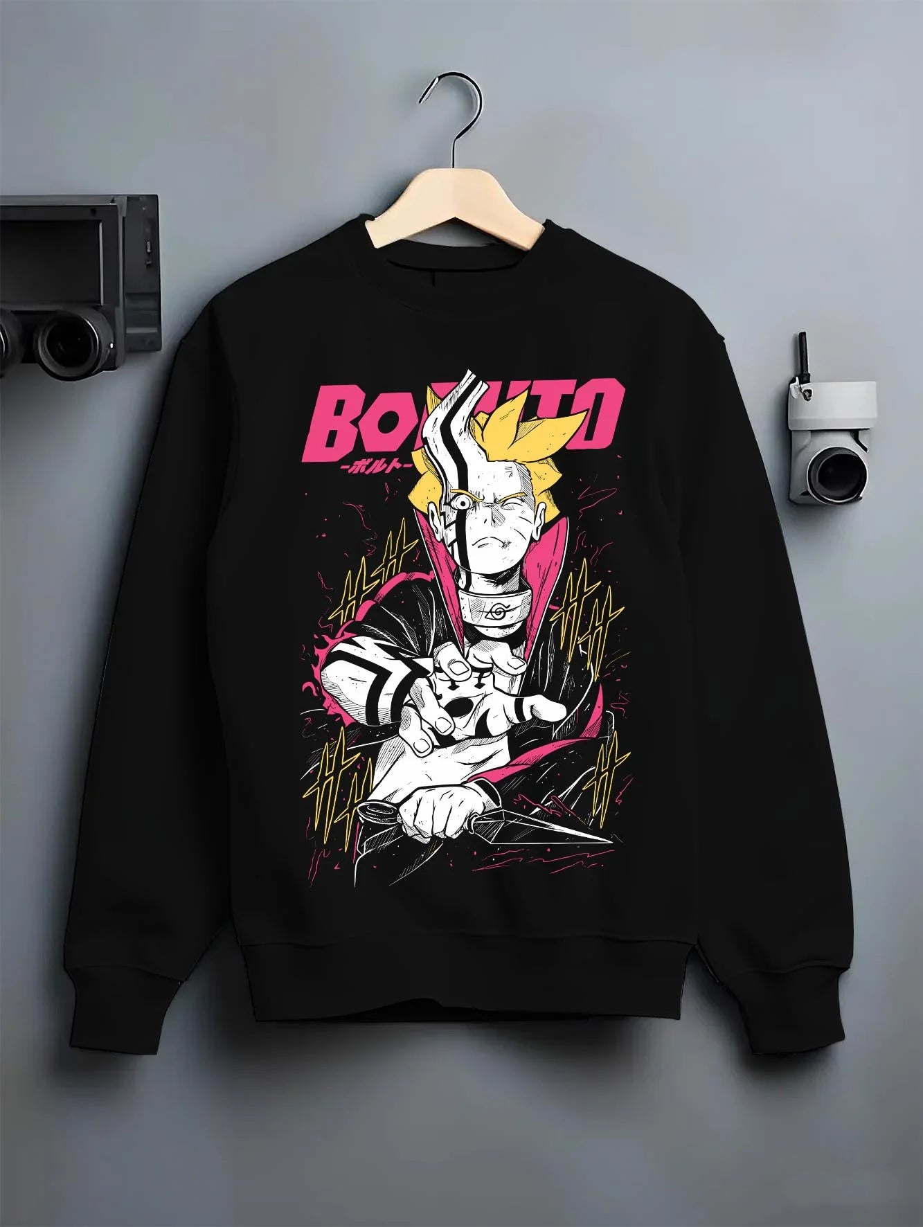 Black crewneck sweatshirt on hanger with Boruto Hoodie Naruto Next Generations Shinobi Panel graphic premium wear.