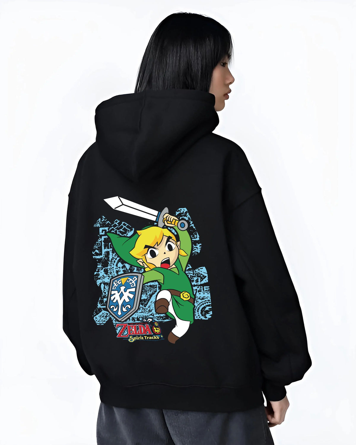 Black hoodie worn by female model from the back featuring Link Breath of the Wild blue tunic artwork.